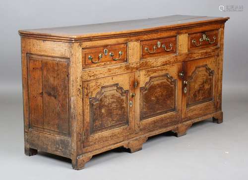 A late 18th century provincial oak dresser base, fitted with...