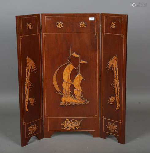 An early/mid-20th century Chinese three-fold screen with app...