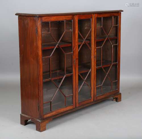 An early 20th century mahogany glazed bookcase, height 118cm...