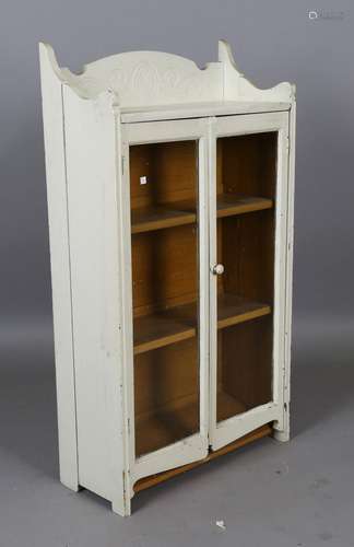 An early 20th century painted pine glazed bookcase, height 1...