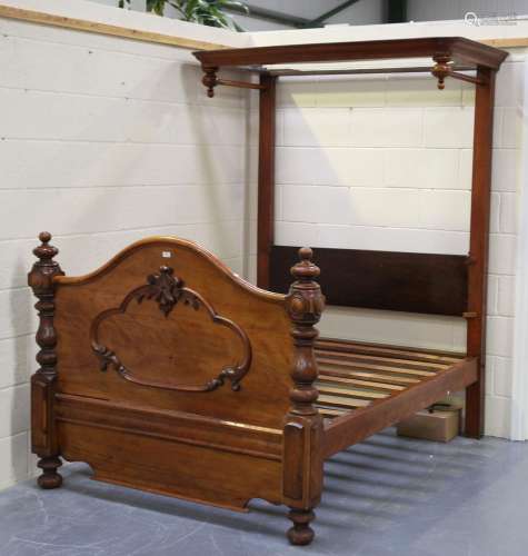 A mid-Victorian mahogany framed half-tester bed with moulded...