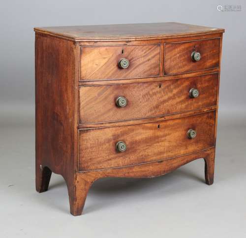 A small Regency mahogany bowfront chest of oak-lined drawers...