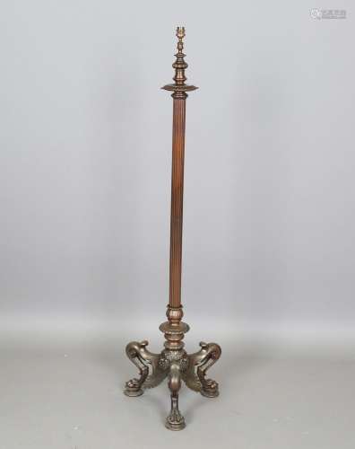 An early 20th century coppered brass lampstandard of Neoclas...