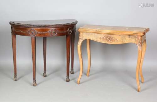 An early 20th century Neoclassical Revival mahogany demi-lun...