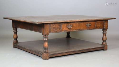 A modern Jacobean style solid oak coffee table, fitted with ...