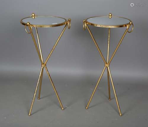 A pair of modern gilt painted metal mirror-topped stands, he...