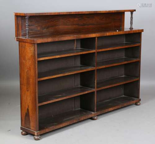 A Regency rosewood open bookcase, the shelf back with acanth...