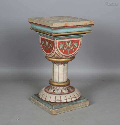 A mid-Victorian Gothic Revival painted softwood pedestal, in...