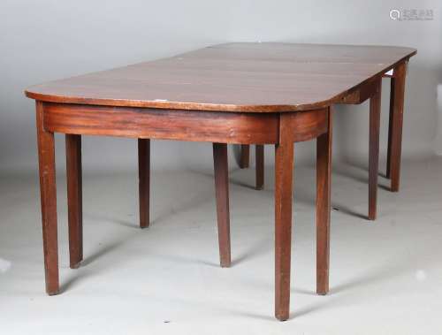 A late George III mahogany 'D' end dining table with central...