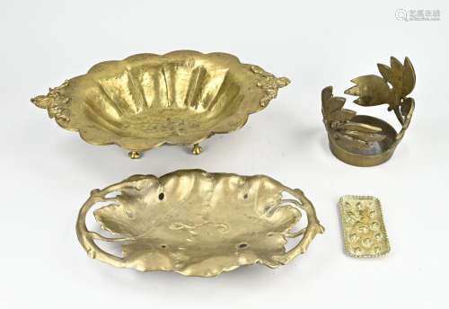 Four brass bowls