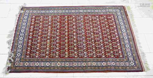 Hand-knotted rug, 171 x 110 cm.