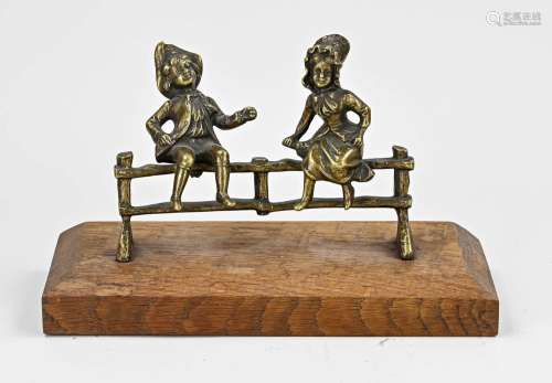 Group of bronze figures, Boy and girl on fence