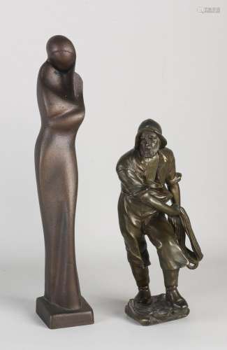 Two bronze figures, Modern + fisherman