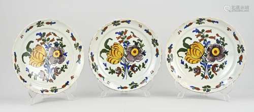 Three 18th century Delft plates, Ø 23 cm.