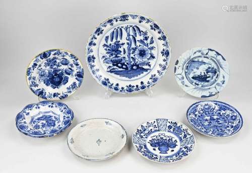 Eight antique Delft plates Ø 22 - 34 cm.