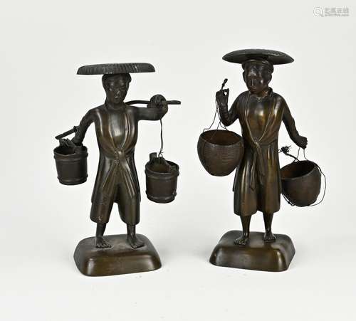 Two Japanese or Chinese figures bearers