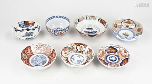 Seven antique Japanese Imari bowls Ø 12 - 17 cm.