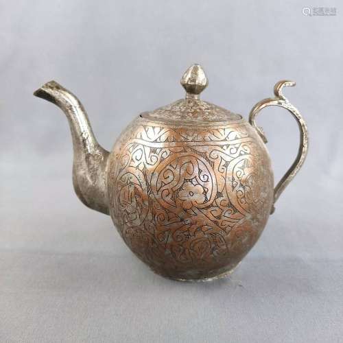Ancient teapot, bulbous form with ear-shaped handle, decorat...