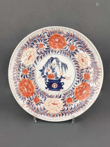 Large plate, Japan, Imari, the mirror painted with a vase of...