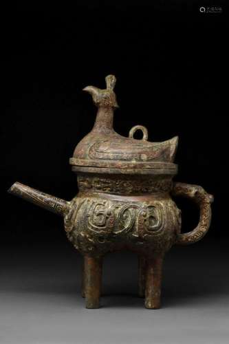 CHINESE ARCHAIC BRONZE POURING VESSEL WITH A BIRD-SHAPED LID
