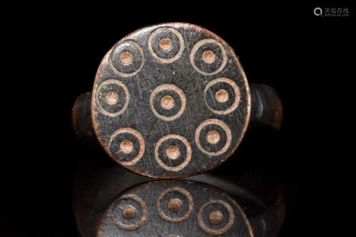 MEDIEVAL BRONZE RING WITH SUN SYMBOLS