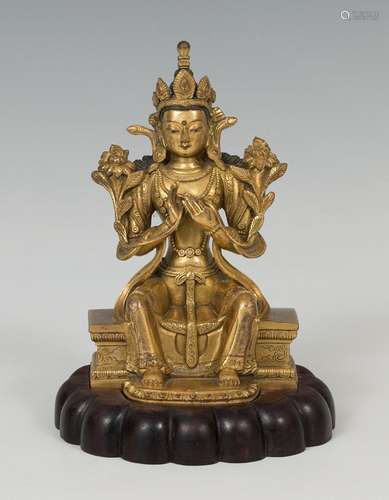 Buddha; Tibet, late 19th century. Ormolu. It has a mark on t...