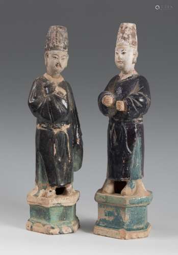 Dignitary couple. China. Ming Dynasty, 17th century. Glazed ...