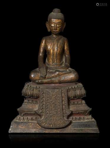 Burma School; XVII century. Partially gilt bronze. It presen...