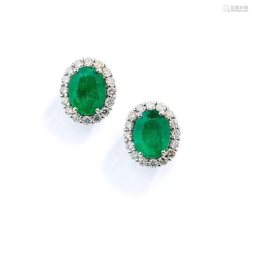 A pair of emerald and diamond cluster earrings