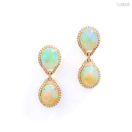 A pair of opal and diamond earrings