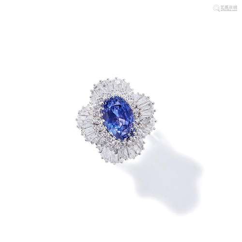 A colour-change sapphire and diamond cluster ring