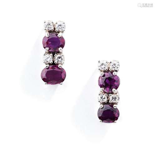 A pair of ruby and diamond earrings