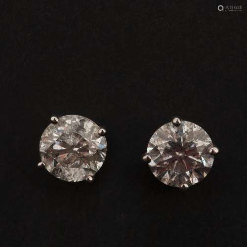 Paire de boucles d'oreilles en or blanc 14 carats serties de...