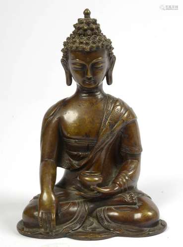 "Bouddha assis" en bronze à patine brune. Travail ...