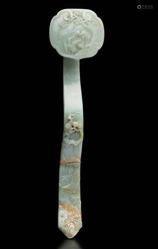 A carved jade and russet Ruyi, China, Qing Dynasty