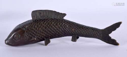 A JAPANESE TAISHO PERIOD BRONZE OKIMONO OF A CARP of natural...