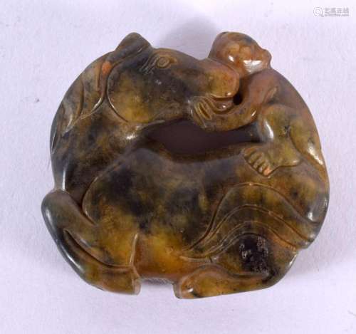 A 19TH CENTURY CHINESE CARVED JADE MONKEY AND HORSE ROUNDEL ...
