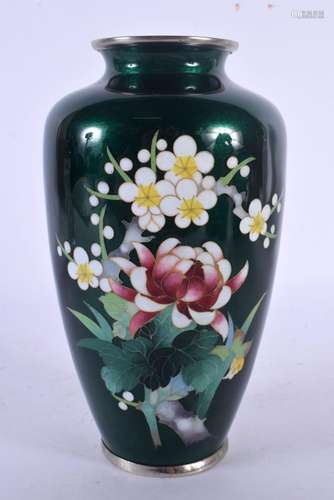 A JAPANESE TAISHO PERIOD GREEN GROUND CLOISONNE ENAMEL VASE....