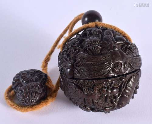 A JAPANESE CARVED BOXWOOD INRO with attached netsuke. Inro 7...