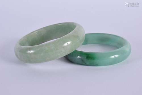 A PAIR OF CHINESE CARVED JADEITE BANGLES 20th Century. 6.5 c...