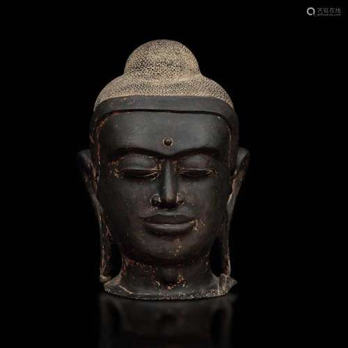 A bronze Buddha head, Cambodia/Laos, 1400s