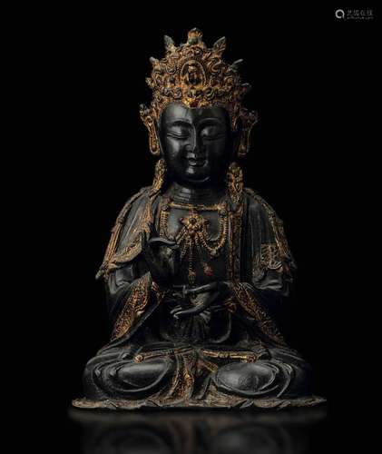 A partly gilt bronze Guanyin, China, Ming Dynasty