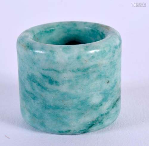 A CHINESE CARVED JADE ARCHERS RING 20th Century. 2.25 cm wid...