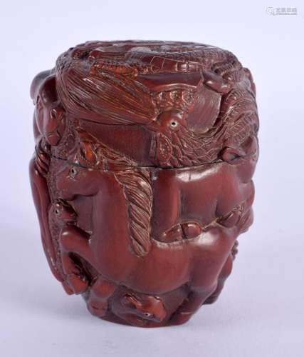 A JAPANESE CARVED WOOD BOX AND COVER. 8 cm x 6 cm.