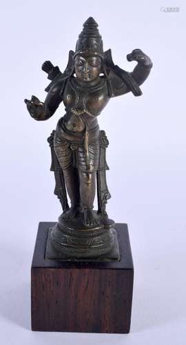 A 19TH CENTURY MIDDLE EASTERN INDIAN BRONZE DEITY upon a woo...