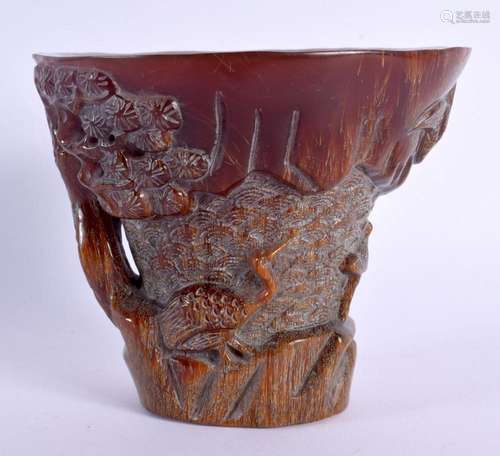 A CHINESE CARVED BUFFALO HORN TYPE LIBATION CUP 20th Century...