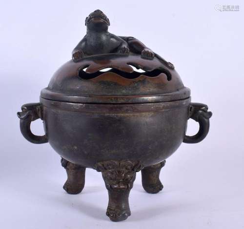 A CHINESE TWIN HANDLED BRONZE CENSER AND COVER 20th Century....