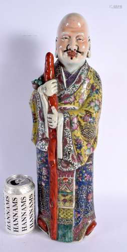 A LARGE CHINESE REPUBLICAN PERIOD FAMILLE ROSE FIGURE embell...