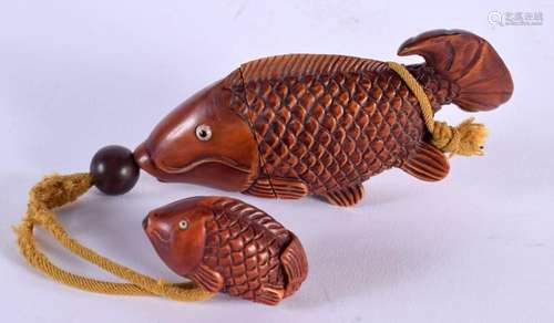 A JAPANESE CARVED BOXWOOD FISH INRO with netsuke. Inro 11.5 ...