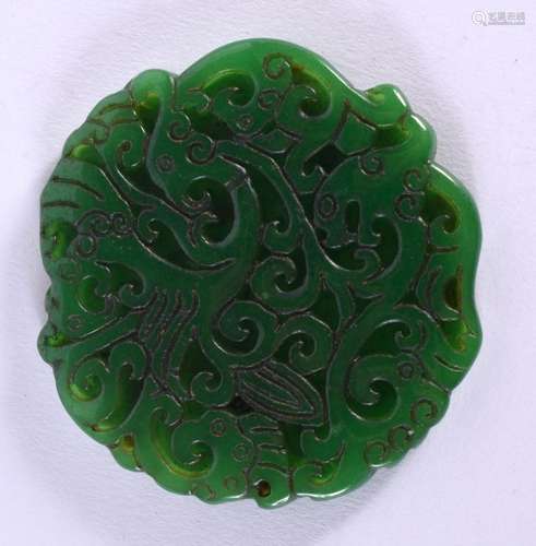 A CHINESE SPINACH JADE PENDANT 20th Century. 7 cm wide.